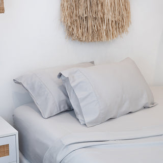 Close-up of  Sienna Living's Cloud Grey eco-friendly pillowcase fabric.